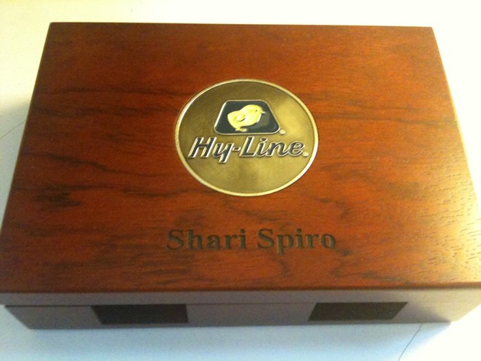 A custom personalized wooden playing card box, engraved with a name. Manufactured by Ad Magic.
